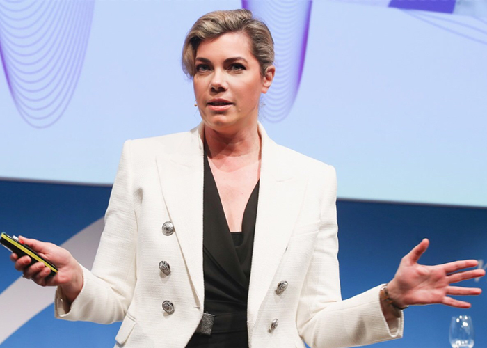 Dr. Anastassia Lauterbach speaking on stage